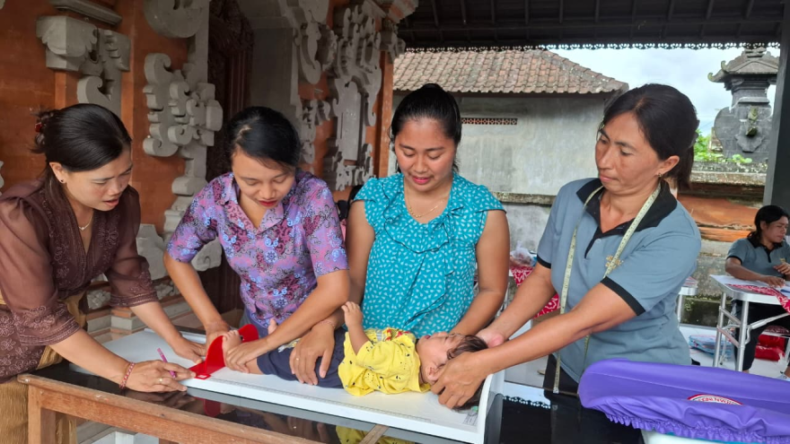 Posyandu Siklus Hidup 6 SPM Kenanga V di Balai Banjar Dinas Kuwum Ancak Bija, Desa Kuwum, Kecamatan Marga, Kabupaten Tabanan